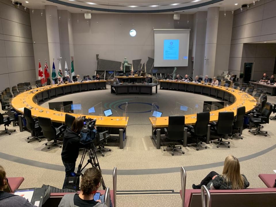 A meeting of the Ottawa Police Services Board in March 2022. A consultant for the board, Hector Addison, is charged with a single count of forging a document. (Guy Quenneville/CBC - image credit)