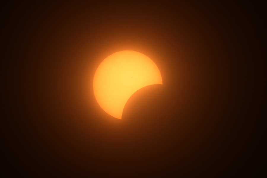 NEW YORK, NEW YORK – APRIL 08: A partial solar eclipse is seen from the Top of the Rock at Rockefeller Center on April 08, 2024 in New York City. While New York City isn’t in the path of totality, it will see up to 90% of the sun covered by the moon. Around New York and in the path of totality, millions of residents and tourists are preparing for a total solar eclipse. This is the first solar eclipse to pass through North America in seven years and will be the last that will be visible from the United States until 2044. (Photo by Michael M. Santiago/Getty Images)