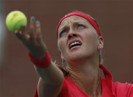 Petra Kvitova of the Czech Republic serves to Alison Riske of the U.S. at the U.S. Open tennis championships in New York August 31, 2013. REUTERS/Eduardo Munoz