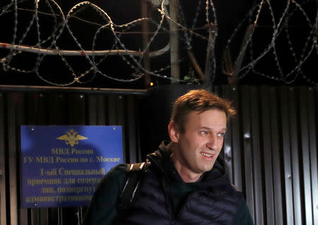 FILE PHOTO: Russian opposition leader Alexei Navalny walks out following his release, after 20 days in jail where he was held on charges of staging an illegal protest last month, in Moscow, Russia October 14, 2018. REUTERS/Maxim Shemetov/File Photo