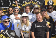 Cast and crew of "The West Wing" attend a Day of Solidarity union rally on Tuesday, Aug. 22, 2023, at Disney Studios in Burbank, Calif. Labor Day is right around the corner. And while many may associate the holiday with major retail sales and end-of summer barbecues, Labor Day's roots in worker-driven organizing feel especially significant this year. (Photo by Jordan Strauss/Invision/AP)