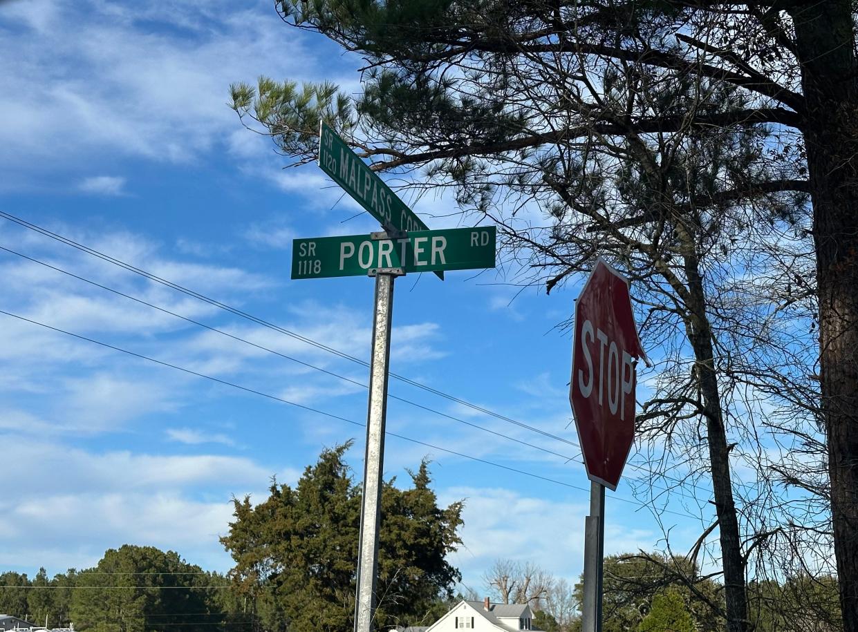 The three parcels of land owned by TW & AG Lumber, LLC sit at the intersection of Malpass Corner Road and Porter Road.