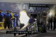 In this photo provided by the NHRA, Top Fuel's Brittany Force races to the provisional No. 1 position in her first-round qualifying run in her Monster Energy dragster at the DeWalt NHRA Carolina Nationals at zMAX Dragway in Concord, N.C., Friday, Sept. 17, 2021. (Randy Anderson/NHRA via AP)