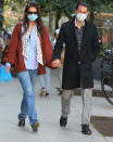 <p>Katie Holmes and Emilio Vitolo Jr. hold hands as they walk to his restaurant in N.Y.C. on Friday.</p>