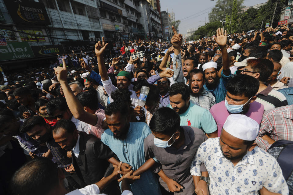 Activists of the Bangladesh Nationalist Party participate in a protest in Dhaka, Bangladesh, Saturday, Oct. 28, 2023. Police in Bangladesh's capital fired tear gas to disperse supporters of the main opposition party who threw stones at security officials during a rally demanding the resignation of Prime Minister Sheikh Hasina and the transfer of power to a non-partisan caretaker government to oversee general elections next year. (AP Photo/Mahmud Hossain Opu)