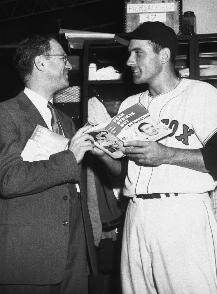 Jim Piersall, Boston Red Sox centerfielder holds copy of his new book 