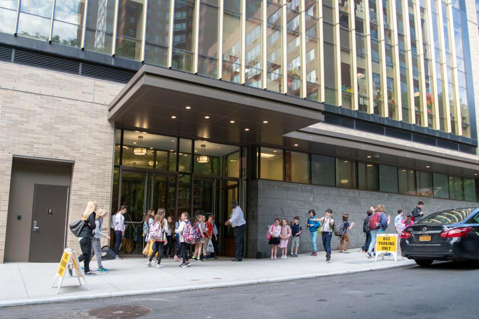 Students wait outside The Windward School, the private school that Isaac Rosenthal attends, for the doors to be opened. The school bills itself as "a school for children with dyslexia and language-based learning disabilities."