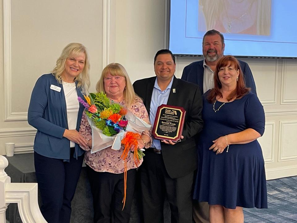 Ocala licensed practical nurse Roxanne Acosta, second from left, was recently honored as the 2022 LPN of the Year at the Florida Health Care Association’s 2022 Excellence in Long Term Care Nursing Awards.