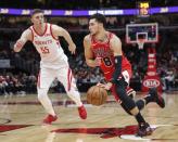 Nov 3, 2018; Chicago, IL, USA; Chicago Bulls guard Zach LaVine (8) drives to the basket against Houston Rockets forward Isaiah Hartenstein (55) during the first half at United Center. Kamil Krzaczynski-USA TODAY Sports