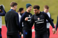 Soccer Football - England Training & Media Day - St. George’s Park, Burton Upon Trent, Britain - March 20, 2018 England's Kyle Walker and John Stones during training Action Images via Reuters/Andrew Boyers