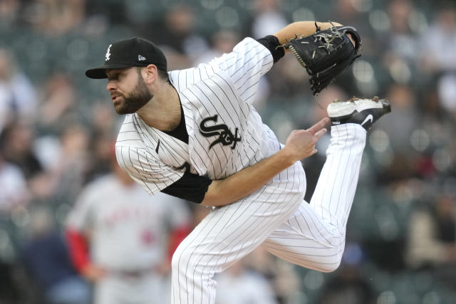 Chicago White Sox' Gavin Sheets, foreground, and Andrew Vaughn, rear, walk  to the dugout after scoring on a double by Romy Gonzalez during the fourth  inning of a baseball game in Cleveland