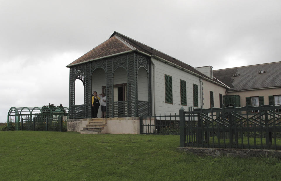 FILE - In this Oct. 14, 2017, file photo, a view fo Longwood House on St. Helena in the Atlantic Ocean, where Napoleon Bonaparte lived during his exile until his death in 1821. Commemorations of the May 5, 1821 death of Napoleon are going ahead on St. Helena, the remote South Atlantic island where the deposed French emperor died in exile. But they are not happening with an influx of international visitors that was expected before COVID-19 swept across the world. While the volcanic island has not had any confirmed COVID-19 cases, reaching it got even harder because of travel restrictions during the pandemic.(AP photo/Christopher Torchia, File)