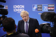 British Prime Minister Boris Johnson arrives for a NATO leaders meeting at The Grove hotel and resort in Watford, Hertfordshire, England, Wednesday, Dec. 4, 2019. As NATO leaders meet and show that the world's biggest security alliance is adapting to modern threats, NATO Secretary-General Jens Stoltenberg is refusing to concede that the future of the 29-member alliance is under a cloud. (AP Photo/Matt Dunham)