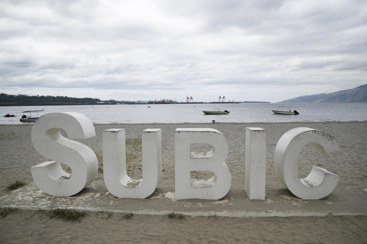 A sign stands on a quiet day in what used to be AmericaÅfs largest overseas naval base at the Subic Bay Freeport Zone, Zambales province, northwest of Manila, Philippines on Monday Feb. 6, 2023. The U.S. has been rebuilding its military might in the Philippines after more than 30 years and reinforcing an arc of military alliances in Asia in a starkly different post-Cold War era when the perceived new regional threat is an increasingly belligerent China. (AP Photo/Aaron Favila)