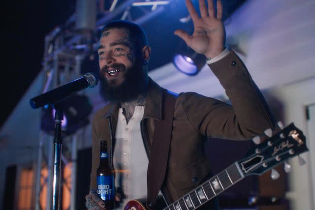 <p>Courtesy of Bud Light</p> Post Malone makes a wish with the Bud Light Genie