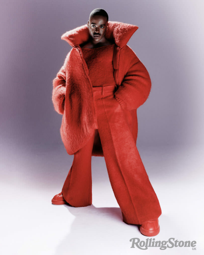 Ncuti Gatwa strikes a pose in a devil-esque red suit