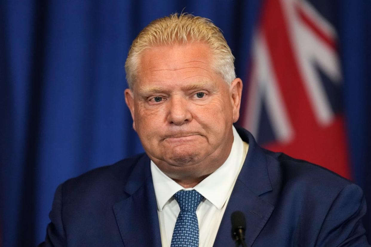 Two new polls suggest that voter support for Premier Doug Ford has dropped in recent weeks, as his government faced heated criticism for granting certain developers permission to build housing on land that had been protected in Ontario's Greenbelt.  (Chris Young/The Canadian Press - image credit)
