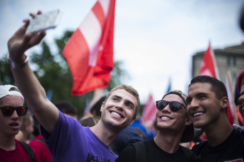 Supporters take selfies after the Supreme Court ruled 5-4 in favor of gay marriage across the U.S. at the Supreme Court building in Washington, D.C., on June 26, 2015. File Photo by Gabriella Demczuk/UPI