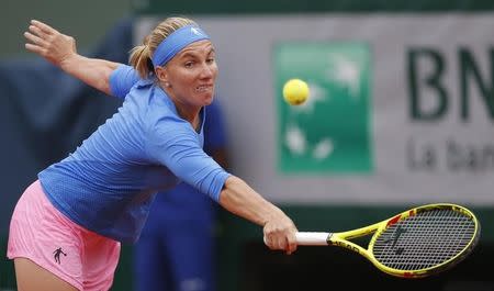 Tennis - French Open - Roland Garros - Svetlana Kuznetsova of Russia v Garbine Muguruza of Spain - Paris, France - 29/05/16. Kuznetsova serves. REUTERS/Gonzalo Fuentes