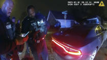 The image from video released on Jan. 27, 2023, by the City of Memphis, shows police officers talking after a brutal attack on Tyre Nichols by five Memphis police officers on Jan. 7, 2023, in Memphis, Tenn. Nichols died on Jan. 10. The five officers have since been fired and charged with second-degree murder and other offenses. (City of Memphis via AP)