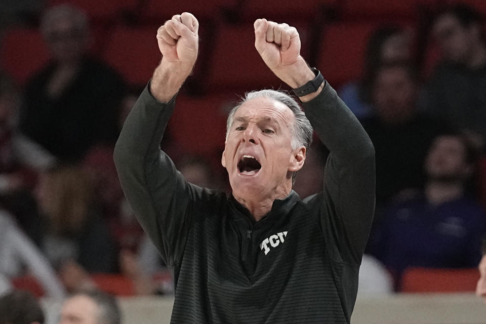 TCU head coach Jamie Dixon shouts in the second half of an NCAA college basketball game against Oklahoma, Saturday, March 4, 2023, in Norman, Okla. (AP Photo/Sue Ogrocki)