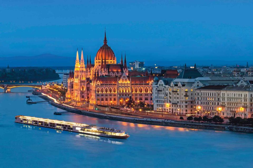 <p>Courtesy of AmaWaterways</p> The Scenic Opal sails past the Hungarian Parliament Building in Budapest.
