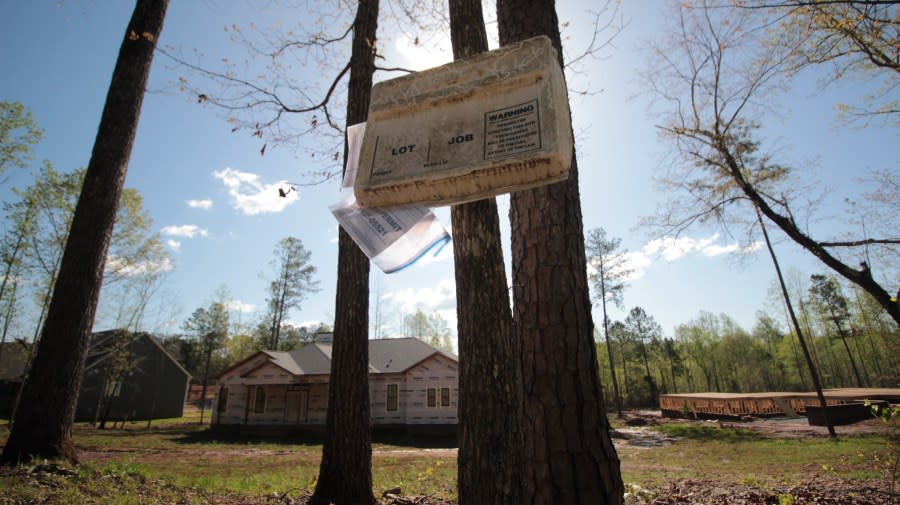 This unfinished home along Furnace Road Extension had a building permit from December 2019 hanging out of the permit box when we visited the site in April 2024.