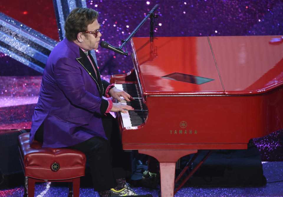 Elton John performs "(I'm Gonna) Love Me Again" nominated for the award for best original song from "Rocketman" at the Oscars on Sunday, Feb. 9, 2020, at the Dolby Theatre in Los Angeles. (AP Photo/Chris Pizzello)