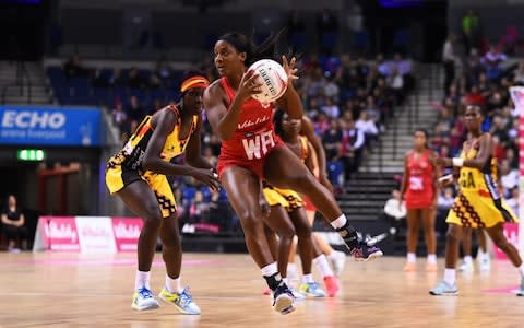  Vitality Roses player Sasha Corbin of England in action during the Vitality Netball International Series match between England and Uganda at the Echo Arena  - Credit: Getty images