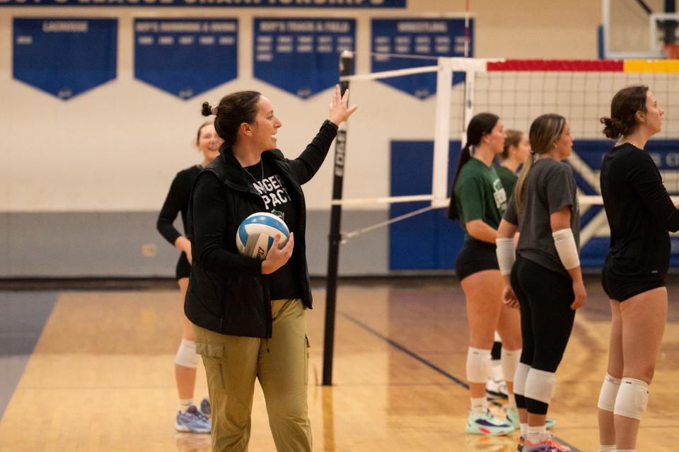 University of Wisconsin-Parkside women's volleyball head coach Leigh Barea instructs players at Harper Creek High School on Thursday, Nov. 9, 2023.