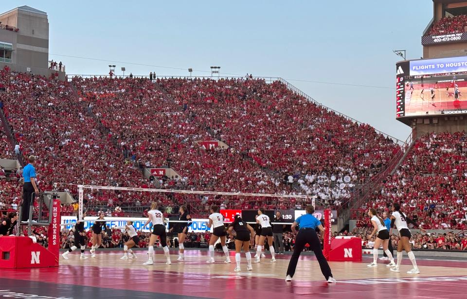Nebraska hosts Omaha in a record-setting volleyball match Wednesday at Memorial Stadium in Lincoln, Neb. The match drew more than 92,000 fans, making it the largest crowd ever to watch a women's sporting event. Texas player Molly Phillips said watching it "was a really emotional experience, seeing how they (the fans) all embraced it."