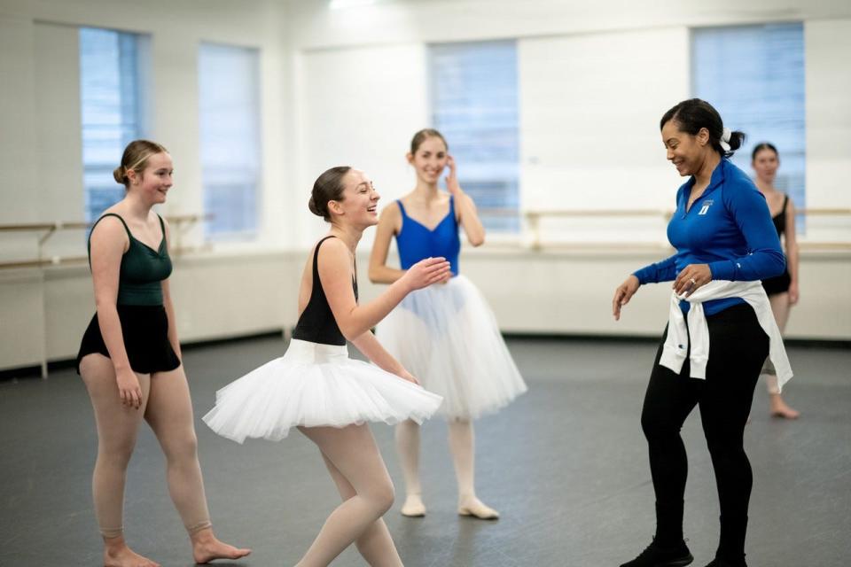 Ballerinas enjoying time together during a long Saturday rehearsal at the Gaston Dance Theatre.