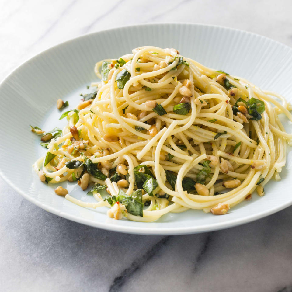 This undated photo provided by America's Test Kitchen in March 2019 shows Garlicky Spaghetti in Brookline, Mass. This recipe appears in the cookbook "Vegetables Illustrated." (Carl Tremblay/America's Test Kitchen via AP)