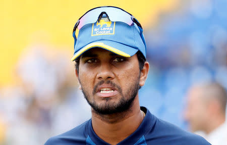 Cricket - Sri Lanka v India - Third Test Match - Pallekele, Sri Lanka - August 14, 2017 - Sri Lanka's captain Dinesh Chandimal reacts after they losing the final test match and the test series against India. REUTERS/Dinuka Liyanawatte