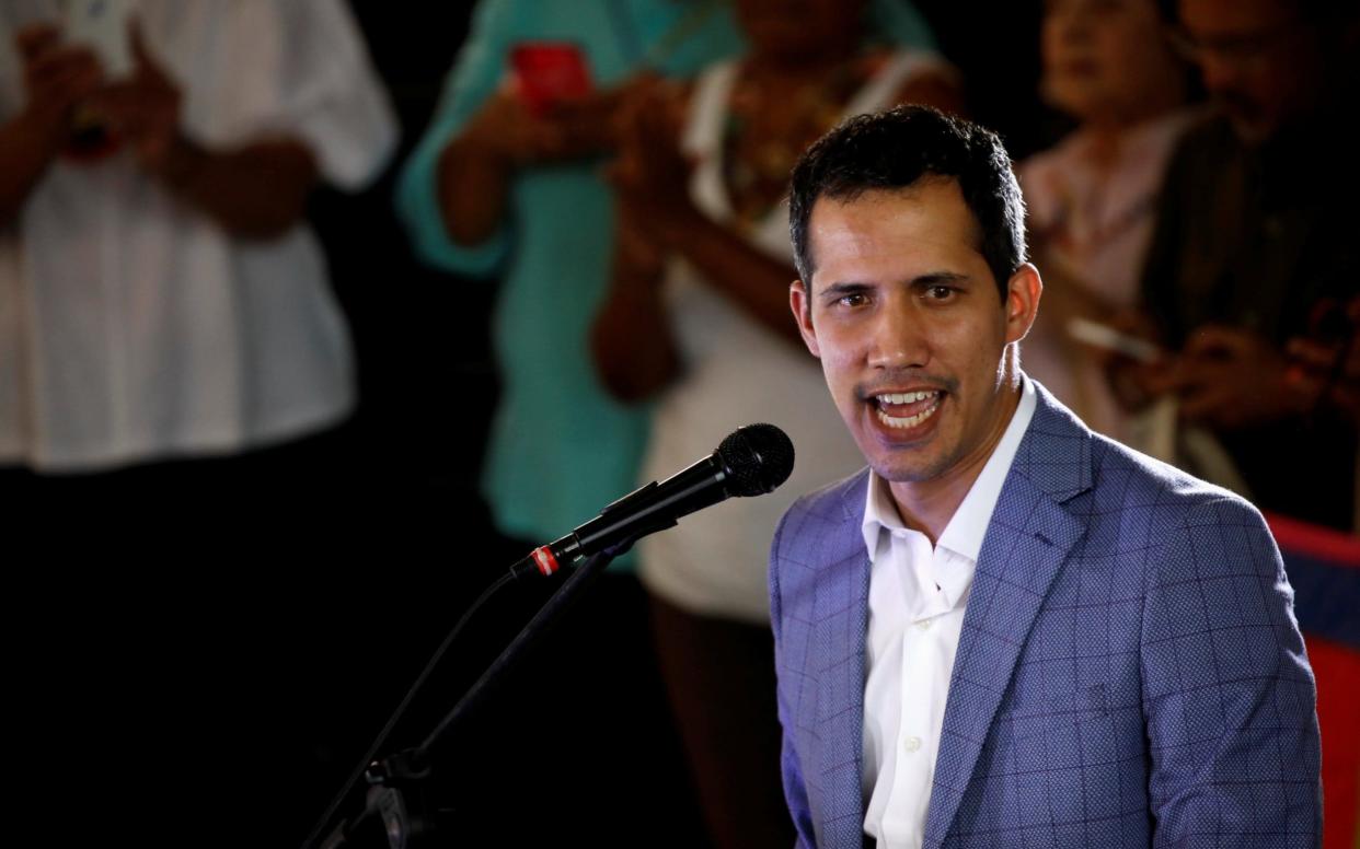 Juan Guaido, recognised by more than 50 nations as the legitimate ruler of Venezuela, was stripped of his parliamentary immunity on Tuesday - REUTERS