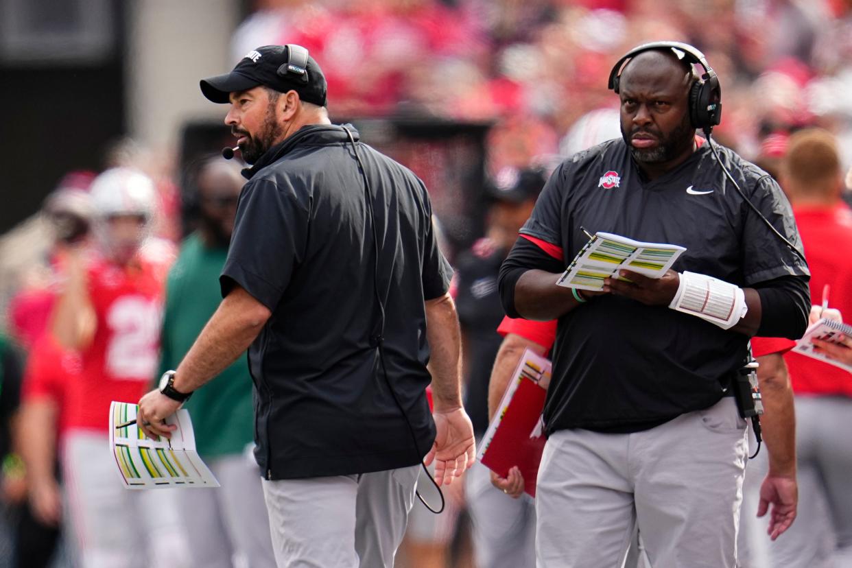 Sep 16, 2023; Columbus, Ohio, USA; Ohio State Buckeyes head coach Ryan Day and running backs coach Tony Alford watch from the sideline during the NCAA football game against the Western Kentucky Hilltoppers at Ohio Stadium. Ohio State won 63-10.