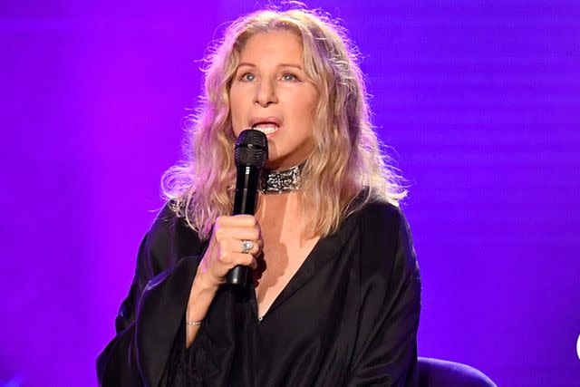 <p>Kevin Mazur/Getty</p> Barbra Streisand performs in Chicago in 2019