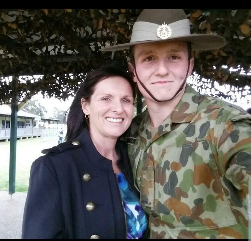 Queensland mum pictured with her son, Simon Walker, who was found dead with his girlfriend after going missing during a camping trip.