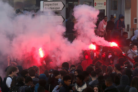 Youths and high-school students attend a demonstration against the French government's reform plan in Marseille, France, December 6, 2018. REUTERS/Jean-Paul Pelissier