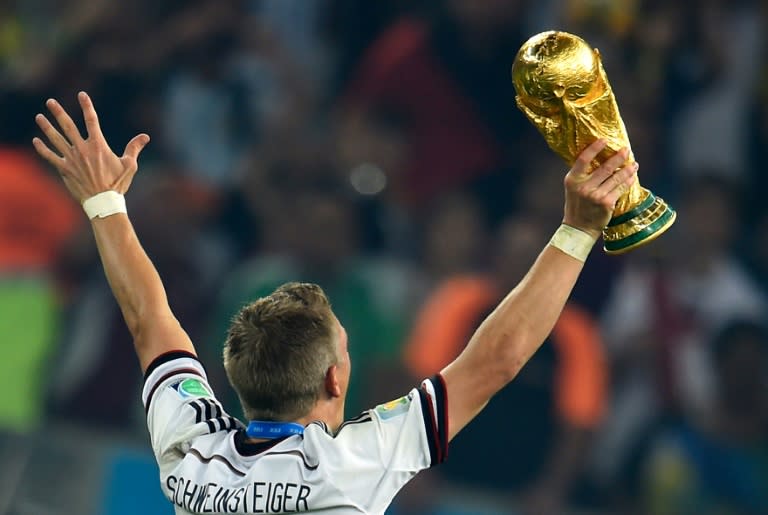 Bastian Schweinsteiger holds the World Cup trophy after Germany beat Argentina in the 2014 final in Brazil