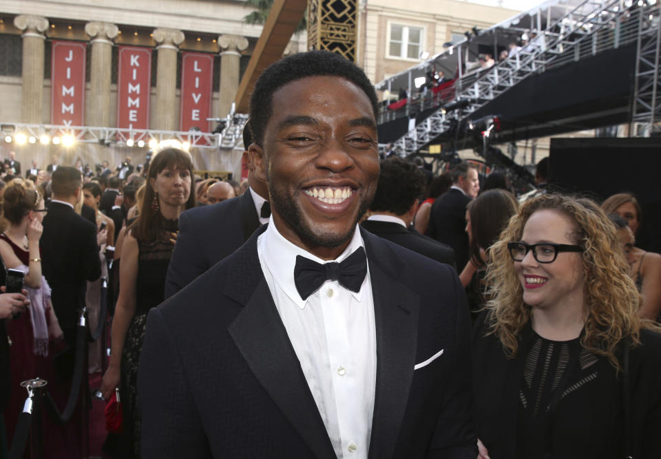 FILE - In this Feb. 28, 2016 file photo, Chadwick Boseman arrives at the Oscars in Los Angeles. Boseman, who played Black icons Jackie Robinson and James Brown before finding fame as the regal Black Panther in the Marvel cinematic universe, has died of cancer. His representative says Boseman died Friday, Aug. 28, 2020 in Los Angeles after a four-year battle with colon cancer. He was 43. (Photo by Matt Sayles/Invision/AP, File)