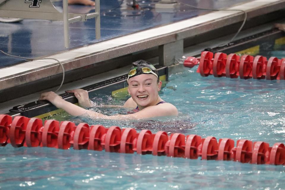 Ally Ricciardi of Pennridge reacts after dropping her time to 52.88 secs in the 100 freestyle.  Swimmers competed at the 2022 District One swimming meet at York's Graham Aquatic Center on February 27, 2022.