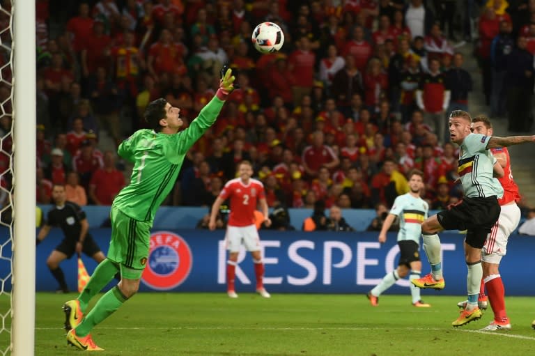 Wales forward Sam Vokes (R) heads the ball to score during the Euro 2016 quarter-final between Wales and Belgium, on July 1, 2016