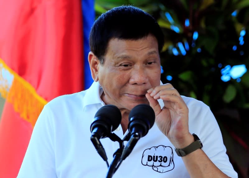 Philippine President Rodrigo Duterte gestures while delivering a speech during the inauguration of a drug abuse treatment and rehabilitation center inside the military headquarters in Fort Magsaysay, in the Nueva Ecija province, north of Manila, Philippines November 29, 2016. REUTERS/Romeo Ranoco 