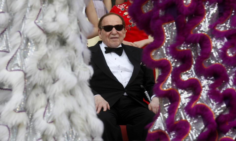 Sheldon Adelson watches the opening ceremony of the Sands Cotai Central in Macau on April 12, 2012. 