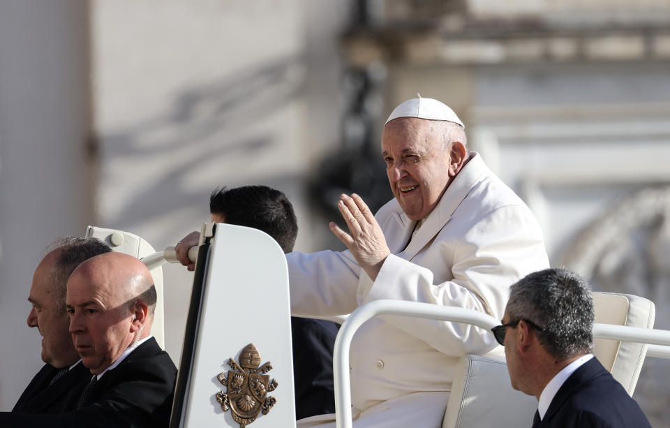 Pope Francis waves as he arrives on his popemobile to lead his weekly audience in St. Peter's Square (Alessia Pierdomenico / Bloomberg via Getty Images)