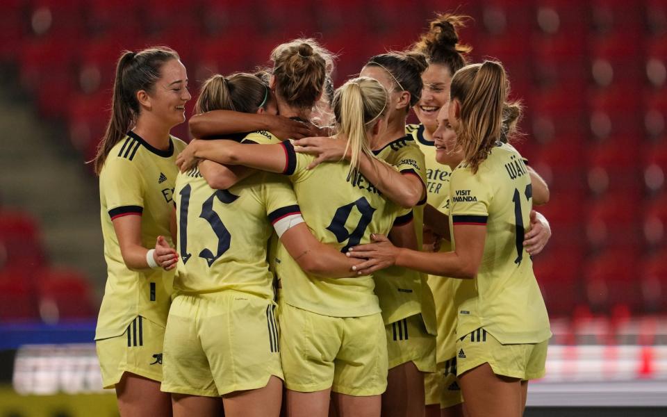 Vivianne Miedema of Arsenal FC celebrates with teammates after scoring their team's third goal and completing her hat-trick during the UEFA Women's Champions League match between SK Slavia Prague Women and Arsenal Women at Eden Stadium on September 09, 2021 in Prague, Czech Republic. - GETTY IMAGES