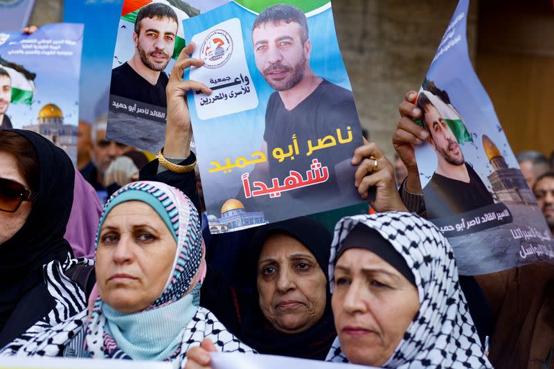 People protest following the death of jailed Palestinian militant Nasser Abu Hmaid, in Gaza City