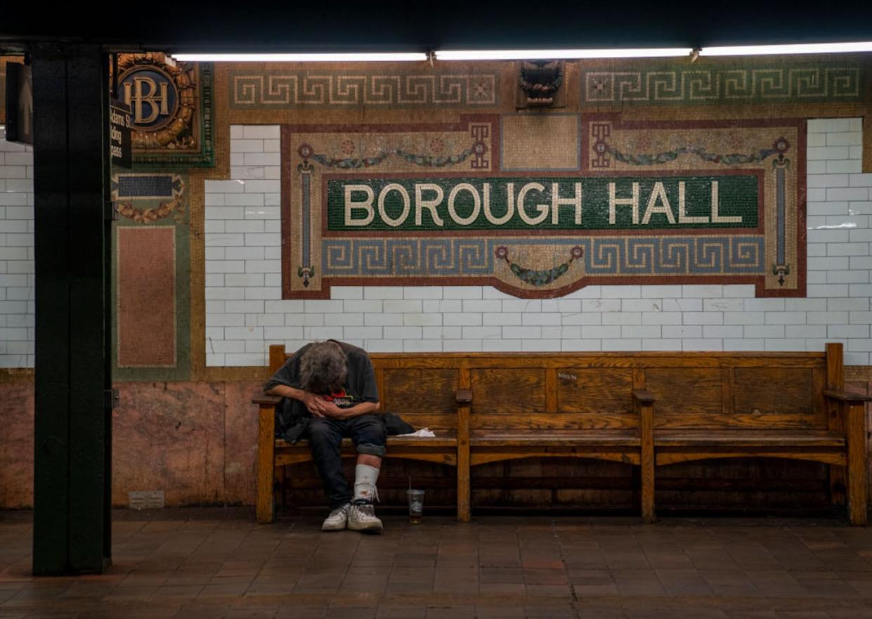 Involuntary treatment for homeless people aims to help – but also raises ethical debates. <a href="https://www.gettyimages.com/detail/news-photo/homeless-man-sleeps-on-a-subway-bench-september-7-2022-in-news-photo/1421695998?phrase=new%20york%20homeless&adppopup=true" rel="nofollow noopener" target="_blank" data-ylk="slk:Robert Nickelsberg/Getty Images;elm:context_link;itc:0;sec:content-canvas" class="link ">Robert Nickelsberg/Getty Images</a>