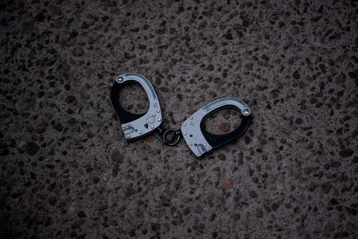 handcuffs on ground